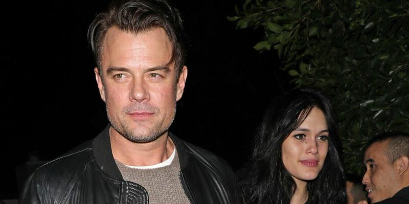 Josh Duhamel holds hands with Audra Mari as they leave a house party together