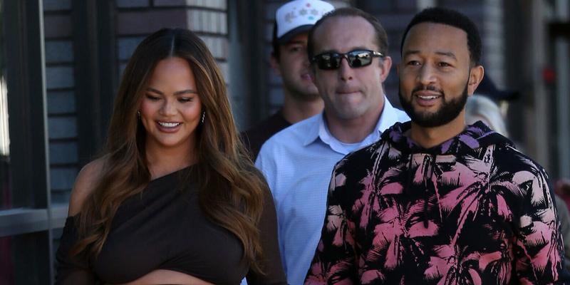 Chrissy Teigen looks radiant as she and husband John Legend help out behind the counter on the 'Cravings, By Chrissy Teigen' food truck in Beverly Hills.