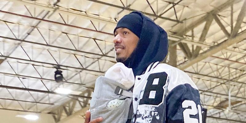 Nick Cannon proves hes a hands on dad as he steps out to his son apos s basketball game with a few of his kids including his new baby