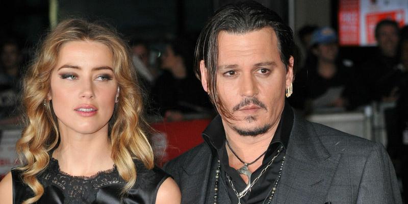 Amber Heard and Johnny Depp attend 'The Danish Girl' premiere during the 2015 Toronto International Film Festival held at the Princess of Wales Theatre on September 12, 2015 in Toronto, Canada.