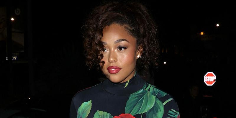 Jordyn Woods stuns in a Rose patterned dress as she steps out of a Rolls Royce for dinner at 'Madeo' Restaurant in West Hollywood, CA