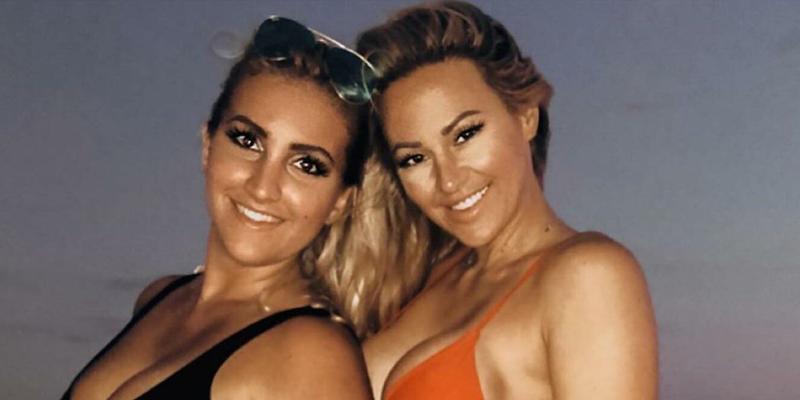 Kindly Myers and Kelly Danielle pose in bikinis