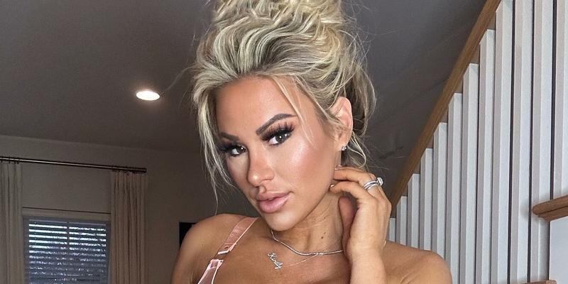 Kindly Myers is "pretty in pink" in strappy lingerie