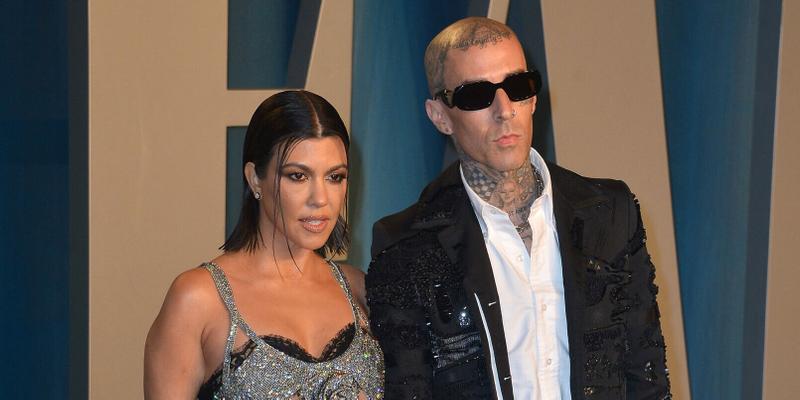 Kourtney Kardashian and Travis Barker at the 2022 Vanity Fair Oscar Party Hosted By Radhika Jones