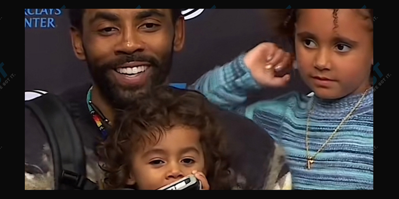 Kyrie Irving and his kids at postgame interview