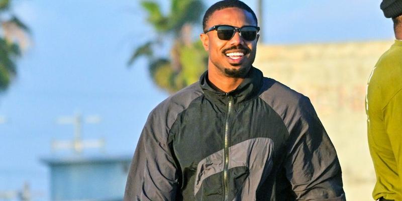 Michael B Jordan is all smiles as he directs quot Creed III quot directing a shirtless Jonathan Majors