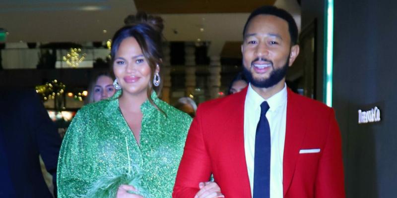 Chrissy Teigen and husband John Legend promote her Cravings cook book meet and greet at Westfield Mall holiday tribute