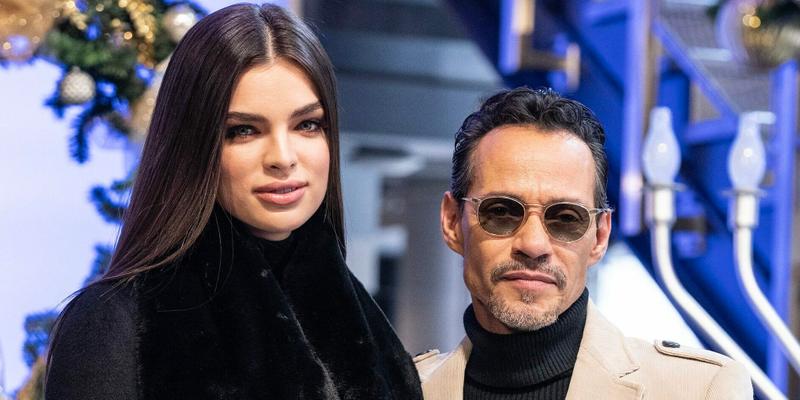 Marc Anthony & Nadia Ferreira pose on grand staircase during visit to Empire State Building