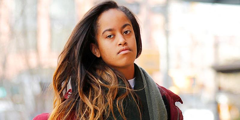 Malia Obama heads to work in New York wearing a red jacket and a super long scarf