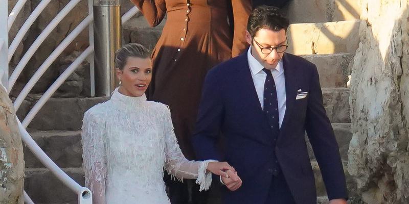 Blushing bride Sofia Richie looks radiant in an elegant white gown as she heads to her lavish wedding rehearsal dinner in the French Riviera