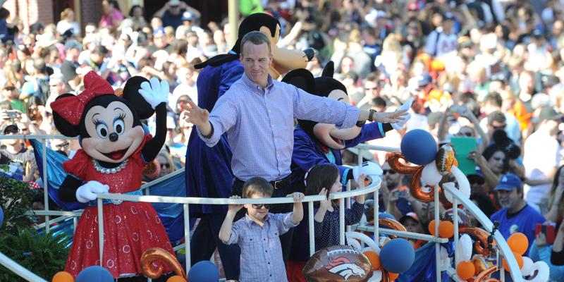 Peyton Manning And Phil Simms Spotted Filming At Magic Kingdom