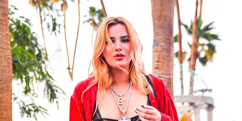 Bella Thorne Looks Sexy In Red While Enjoying Herself At Coachella in Indio, CA.