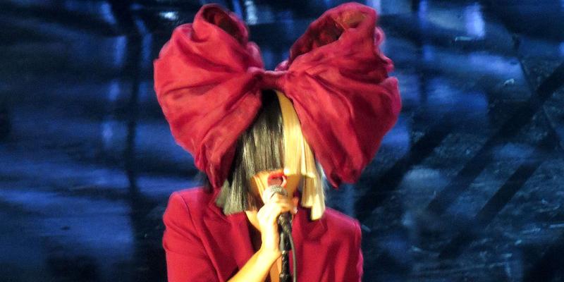 Sia looks like a christmas present as she performs at 'Shining a Light' concert in LA!