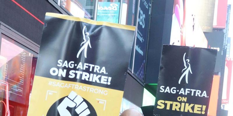 SAG-AFTRA strikers seen outside of the Paramount Building in Times Square