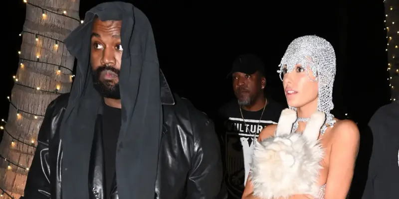Kanye West's wife Bianca Censori is nearly naked in an X-rated silver string ensemble covering up with only a stuffed cat as the duo cause a stir at Miami's LIV nightclub.