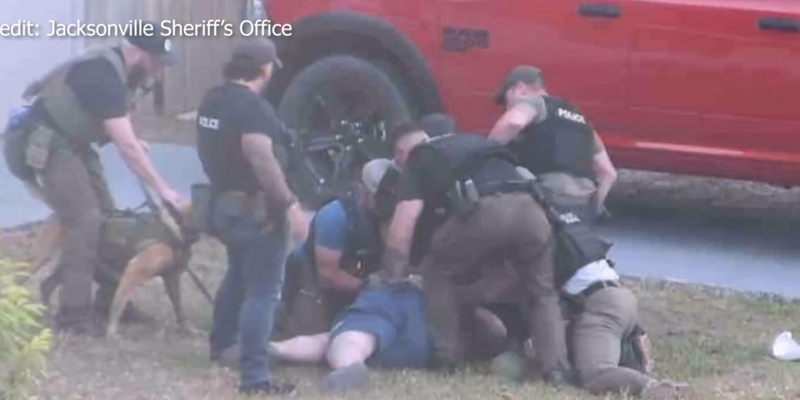 Austin Maddox being tackled to the ground during arrest