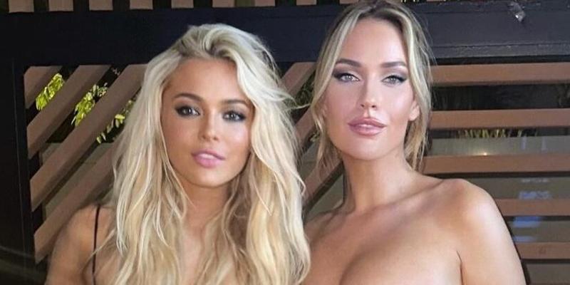 Olivia Dunne and Paige Spiranac pose for the camera.
