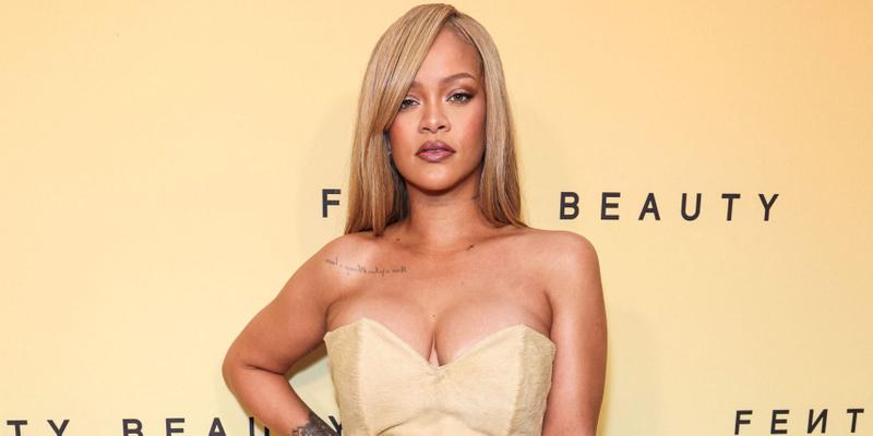 Rihanna poses on the red carpet at Rihanna x Fenty Beauty New Product Launch For Fenty Beauty Soft'Lit Naturally Luminous Longwear Foundation
