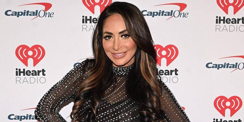 Angelina Pivarnick poses on the red carpet at iHeartRadio z100's Jingle Ball 2023
