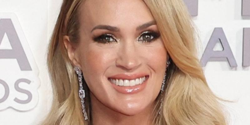 Carrie Underwood smiles at an event