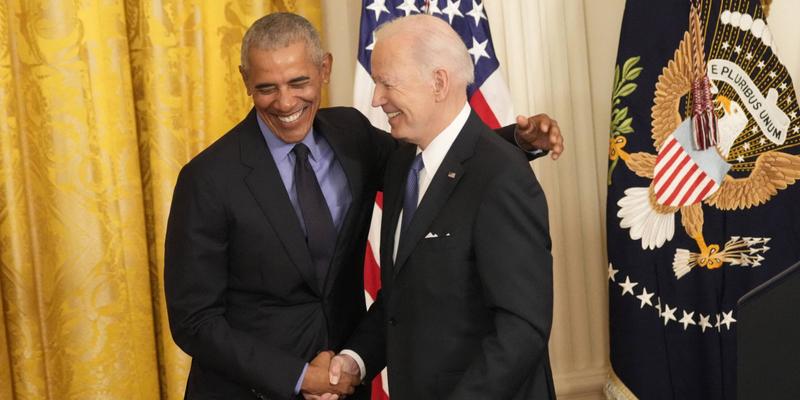 Barack Obama and Joe Biden shaking hands
