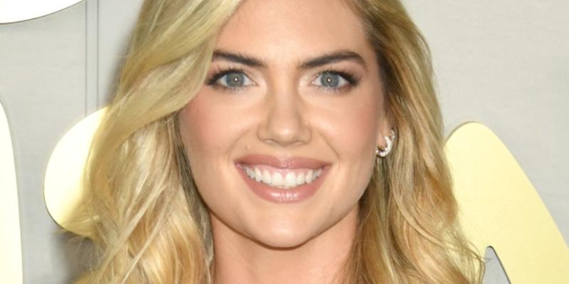 Kate Upton smiles at an event