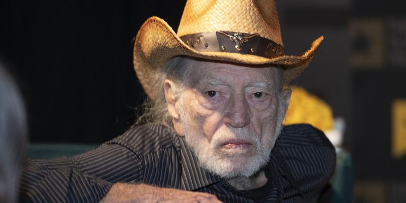 Willie Nelson wearing a cowboy hat