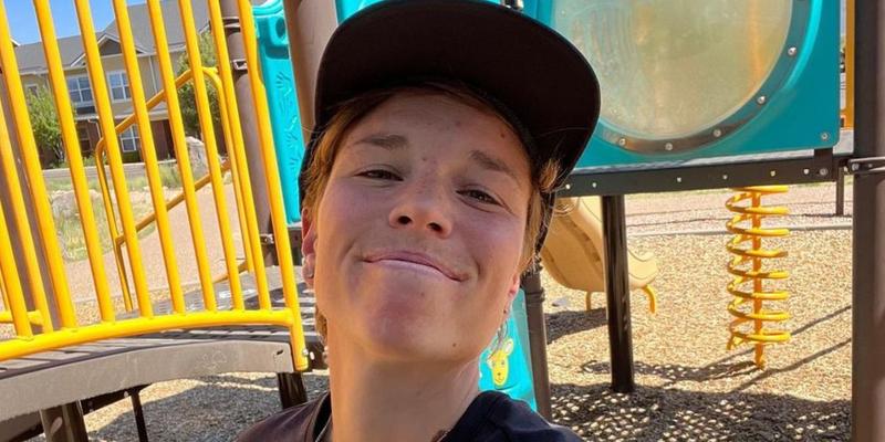 Nikki Hiltz posing on a playground