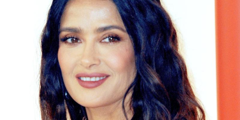 Salma Hayek smiles at an event