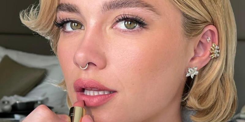 Florence Pugh has lipstick applied