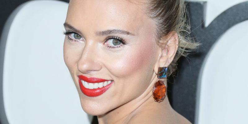 Scarlett Johansson smiles at an event