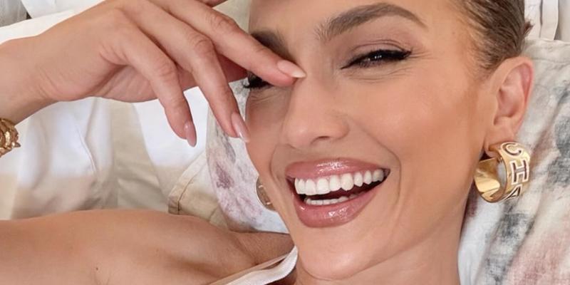Jennifer Lopez poses smiling