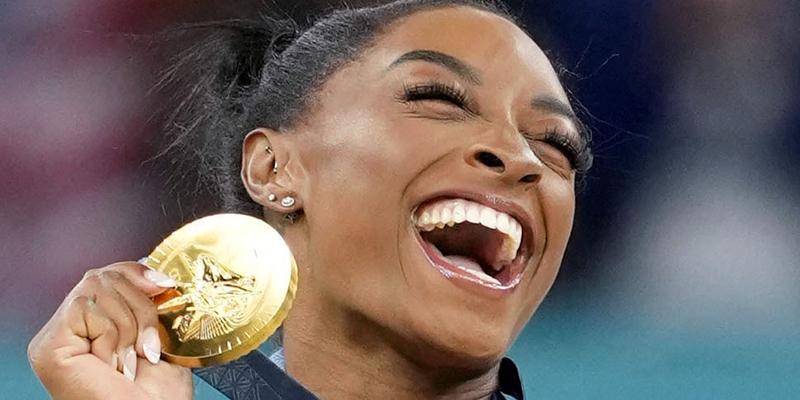 Simone Biles of the United States poses after winning gold in the women's artistic gymnastics individual vault final at the Paris Olympics on Aug. 3, 2024