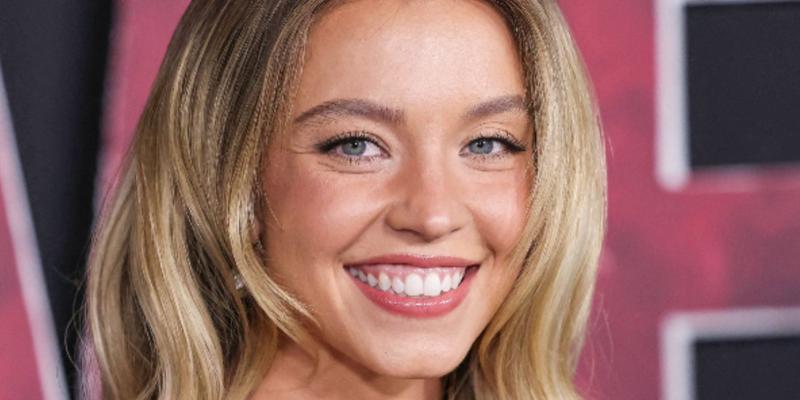 Sydney Sweeney smiling close up