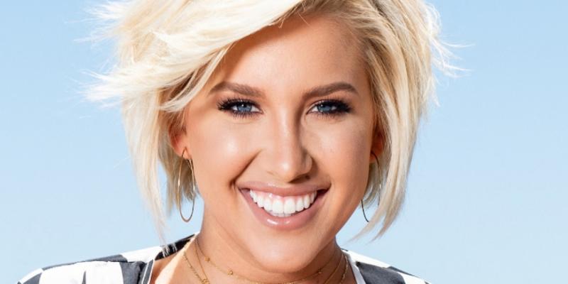 Savannah Chrisley smiling outdoors