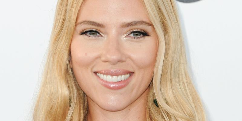 Scarlett Johansson smiles at an event