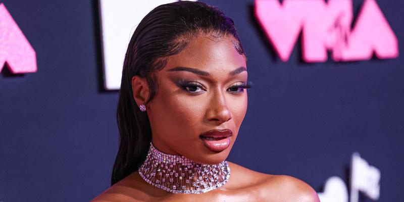 Megan Thee Stallion wearing a Brandon Blackwood dress and Jacob and Co. jewelry arrives at the 2023 MTV Video Music Awards