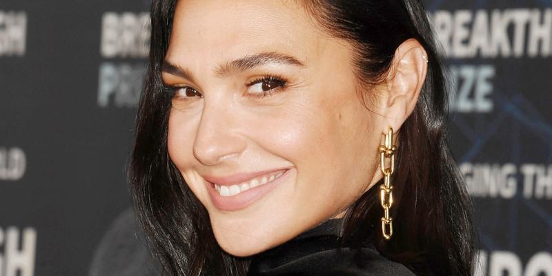 Gal Gadot smiles at a premiere