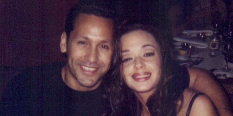 A photo of Leah Remini and husband Angelo Pagán smiling