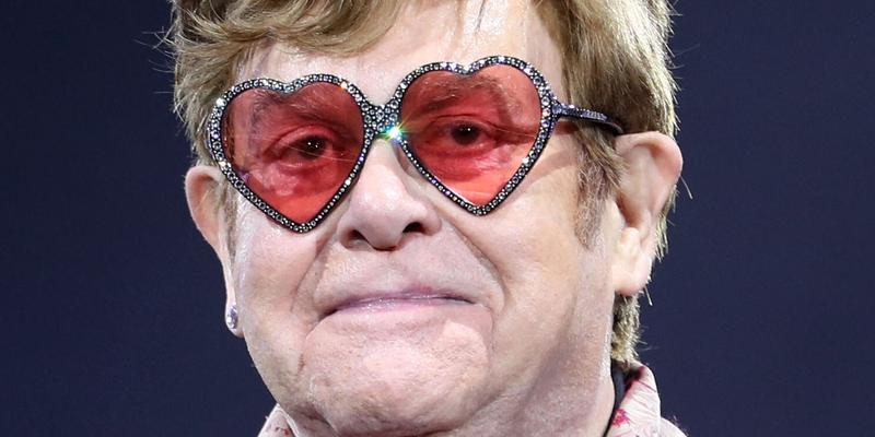 Elton John wearing heart-shaped glasses