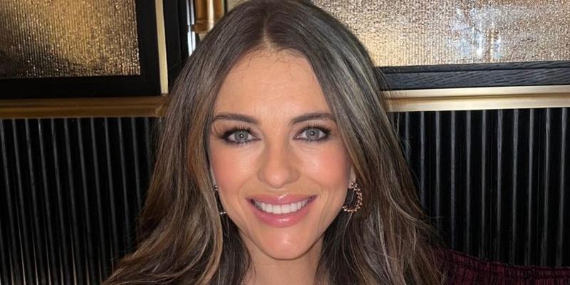 Elizabeth Hurley smiles at the camera.