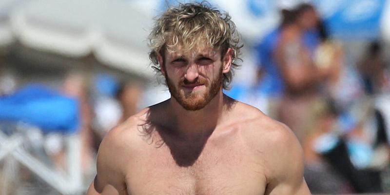 Logan Paul shows off his muscular physique as he hits the beach with bikini-clad girlfriend Nina Agdal in Miami. 23 Oct 2022 Pictured: Logan Paul; Nina Agdal. Photo credit: MEGA TheMegaAgency.com +1 888 505 6342 (Mega Agency TagID: MEGA910542_002.jpg) [Photo via Mega Agency]