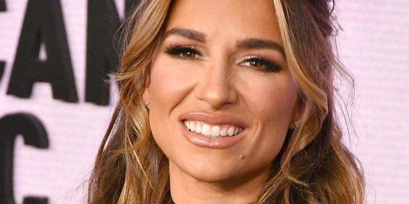 Jessie James Decker smiles at an event