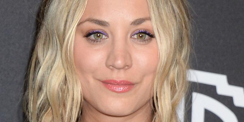 Kaley Cuoco smiles at an event