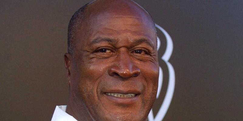 John Amos in white shirt