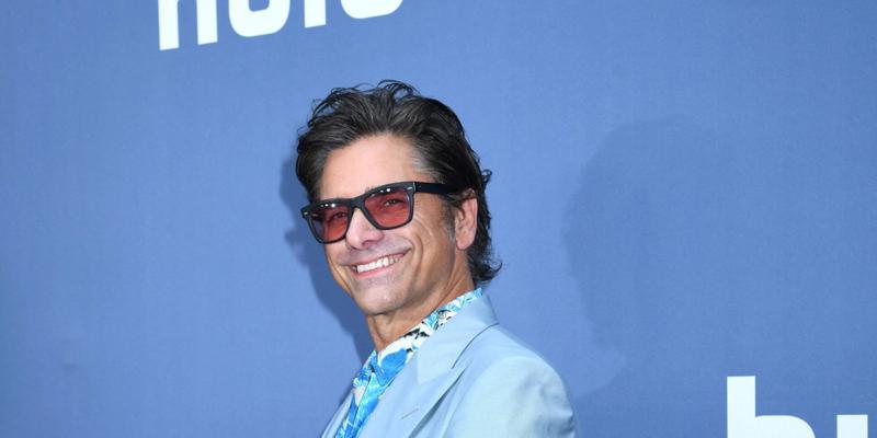 John Stamos is all smiles at premiere for UnPrisoned