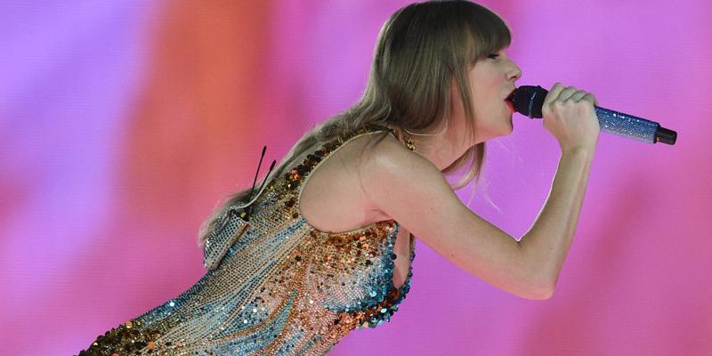 Taylor singing on stage