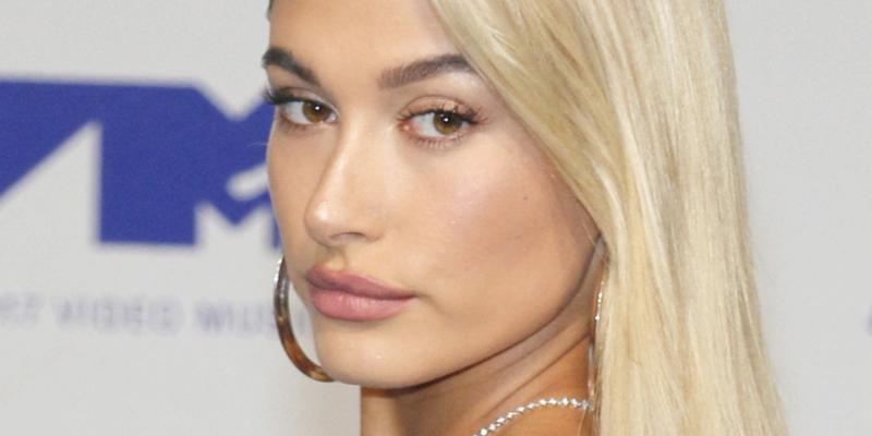 Hailey Bieber poses up close