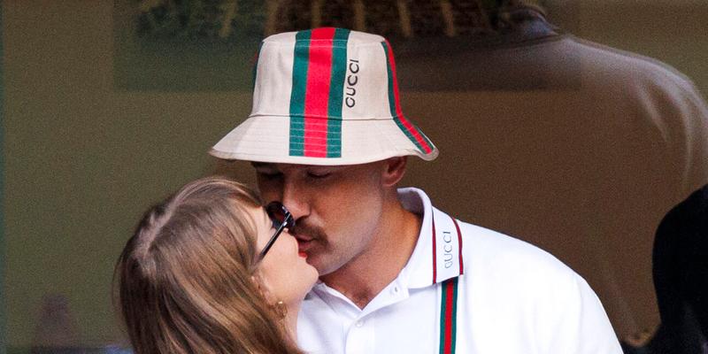 Taylor and Travis smooch at the US Open