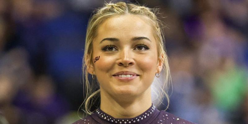 March 8, 2024: LSU's Olivia Dunne smiles to a fan during the Purple and Gold Podium Challenge woman's gymnastics quad meet at the Raising Canes River Center in Baton Rouge, LA. Jonathan Mailhes/CSM (Credit Image: © Jonathan Mailhes/Cal Sport Media) Newscom/(Mega Agency TagID: csmphotothree239106.jpg) [Photo via Mega Agency]